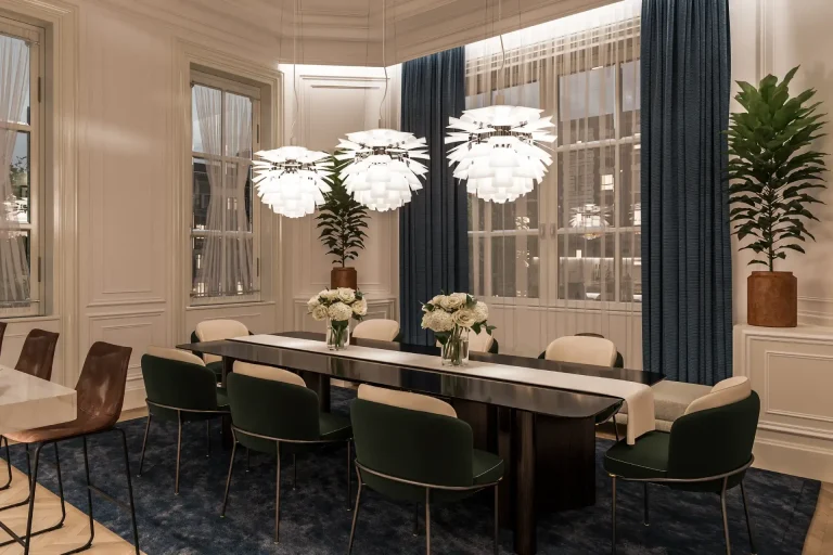 Luxury dining room interior designed by Aghbary Tex. showcasing Green chairs and a dark table are featured. Blue curtains and white lights are included in the design